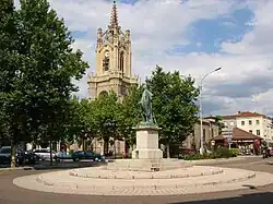 The church with a statue of Michel Combe, a commander of the French Foreign Legion