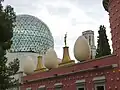 Image 1The Dalí Theatre and Museum, commemorating Salvador Dalí in his home town of Figueres, Catalonia, has a geodesic dome and is decorated with giant eggs.