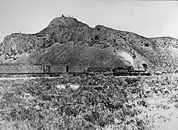 The Jupiter leads the train that carried the ceremonial spike, Leland Stanford, one of the "Big Four" owners of the Central Pacific Railroad, and other railway officials to the Golden Spike Ceremony.