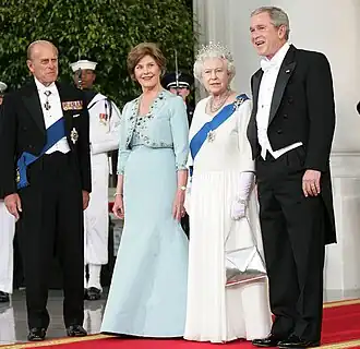 President George W. Bush and First Lady Laura Bush with Queen Elizabeth II and Prince Philip, Duke of Edinburgh at the beginning of an official dinner at the White House, 2007