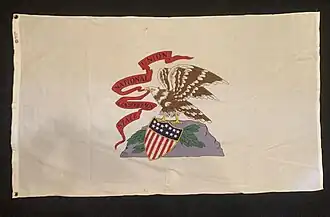 Older state flag featuring the eagle on a larger rock