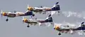 Zlín Z-50s of The Flying Bulls aerobatics team at Aero India 2013