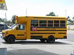 Photo showcases a small bus used for people with disabilities