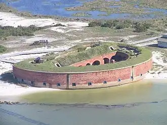 Semicircular red fort on the beach