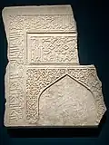 Fragmentary tombstone in the shape of a mihrab. Samarkand, 1385-1400. Louvre Museum OA 4080.[65]