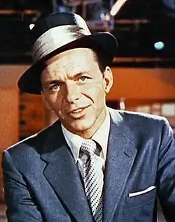 A color picture of Frank Sinatra wearing a hat
