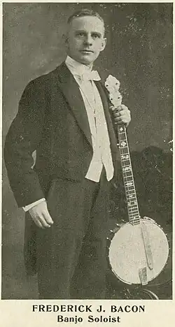 Frederick J. Bacon with his banjo, at the annual concert of the American Guild of Banjoists, Mandolinists and Guitarists, at Witherspoon Hall, Philadelphia, May 27, 1918. He performed with Samuel Siegel and William Foden.