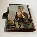 Mid-19th century folding needle book with 2 packets of R J Roberts needles inside