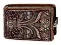 Folger Shakespeare Library's V.a.94. A velvet and embroidered binding by Esther Inglis (?), ca. 1608. Red velvet over pasteboard, decorated with silver thread embroidery and seed pearls. Silver clasp.
