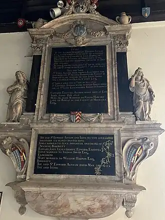 Sir Edward Altham's marble monument with pilasters, pediment, urns, and angels.