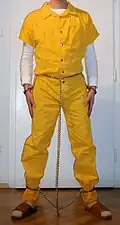 Inmate in "full harness" transport restraints