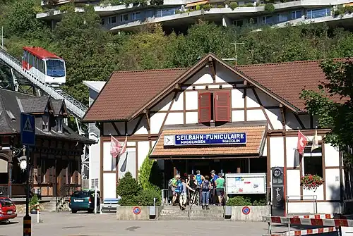 Lower station in 2015, with funicular car approaching over the adjacent bridge