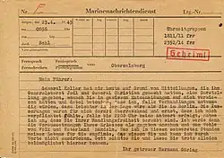 a yellowing German-language form with typewritten details and a red classification stamp