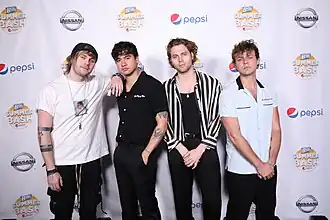 Image 103Typical late 2010s fashion of Australian band 5 Seconds of Summer in 2018 (from 2010s in fashion)