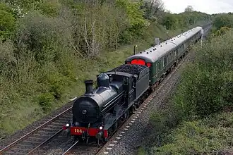 GSWR 186 passing near the site of Seagoe Station on a Railway Preservation Society of Ireland service.