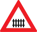6a: Level crossing with barriers
