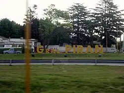 Entrance sign to the town