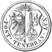 Obverse of coin. "IHS" surrounded by rays, above the coat of arms of Geneva.