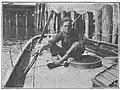 Gerbault at the aft deck with his hand on the tiller
