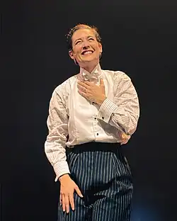Gerianne Pérez wearing the finale costume as Ewen Montagu in Operation Mincemeat: A New Musical.