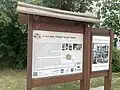 Information signs in German, reflective of the town's German roots and minority.