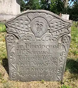 An elaborate schist gravestone carved by Gershom Bartlett of Bolton