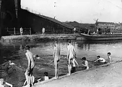 Boys swimming nude in Regents canal during a heatwave in 1911