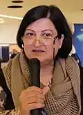 Wife of Ibraheem Sharif, former member of Waad.[142][143]