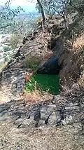 Rock cut water cistern
