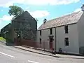 Giffen mill and Miller's house. The doorway is said to have come from the old castle.