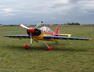 Giles G-202 aerobatic airplane parked at Lučko Airport