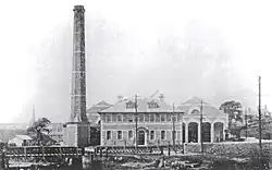 The depot complex c. 1910. The Glossop Brook iron bridge appears in the foreground.
