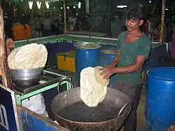 Deep-fried papad being prepared at an exhibition in Guntur, India