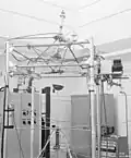 Lady Godiva assembly, with damaged supporting rods after the excursion of February 1954. Note the images are of different assemblies.[38]