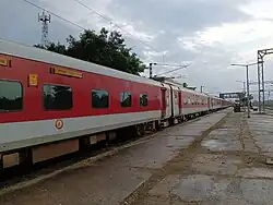 12505 North East SF Express Standing on Platform 1 at GossaigaonHat