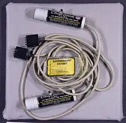 Corded radios disguised within chapstick tubes