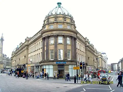 Central Exchange building on Grainger Street with Monument on left and Market Street on right.