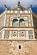 Detail of the minaret with the Muslim Seal of Solomon