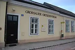 "Ortszentrum Grossau" community centre building, housing the fire station, a kindergarten, and a community function room