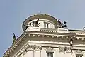 Statues of griffins on the roof.