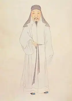 A color portrait of Gu Yanwu, wearing a hood and robes
