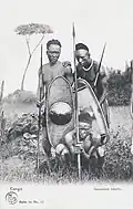 Upoto warriors from the Congo region, photographed between 1900 and 1906, in what is now the Democratic Republic of the Congo.