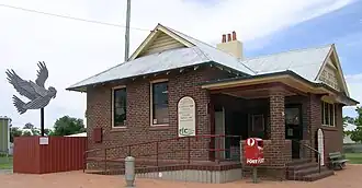 One of the many sculptured galahs and the post office, Gulargambone