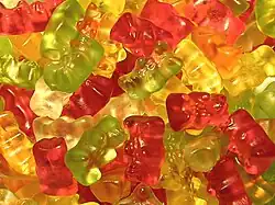 A pile of red, yellow, and green gummy bears