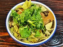 Guoba Cuisine sold in a Tianjin-taste restaurant in Shenzhen