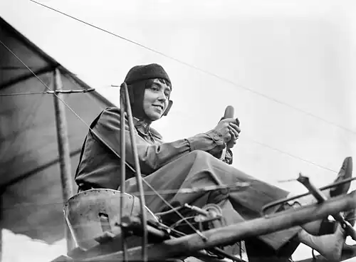 Image 11 Hélène Dutrieu Photo credit: Bain News Service Hélène Dutrieu, shown here in her aeroplane ca. 1911, was the fourth woman in the world (the first from Belgium) to earn a pilot's license and reputedly the first woman to carry passengers and to fly a seaplane. Besides being a pilot, she was a cycling world champion, stunt cyclist, stunt motorcyclist, automobile racer, wartime ambulance driver, and director of a military hospital. More selected pictures