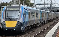 A High Capacity Metro Train departs Westall station heading to Cranbourne.