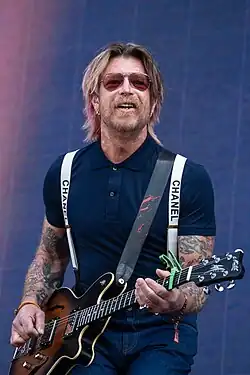 Hughes performing in 2025