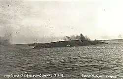 Image 26Australia on her side and sinking during her scuttling in April 1924 (from History of the Royal Australian Navy)