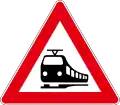 A35 Railway crossing without barriers ahead